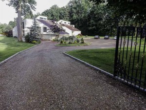 Blacktop Driveway Construction Base Installation in Brookhaven, New York.